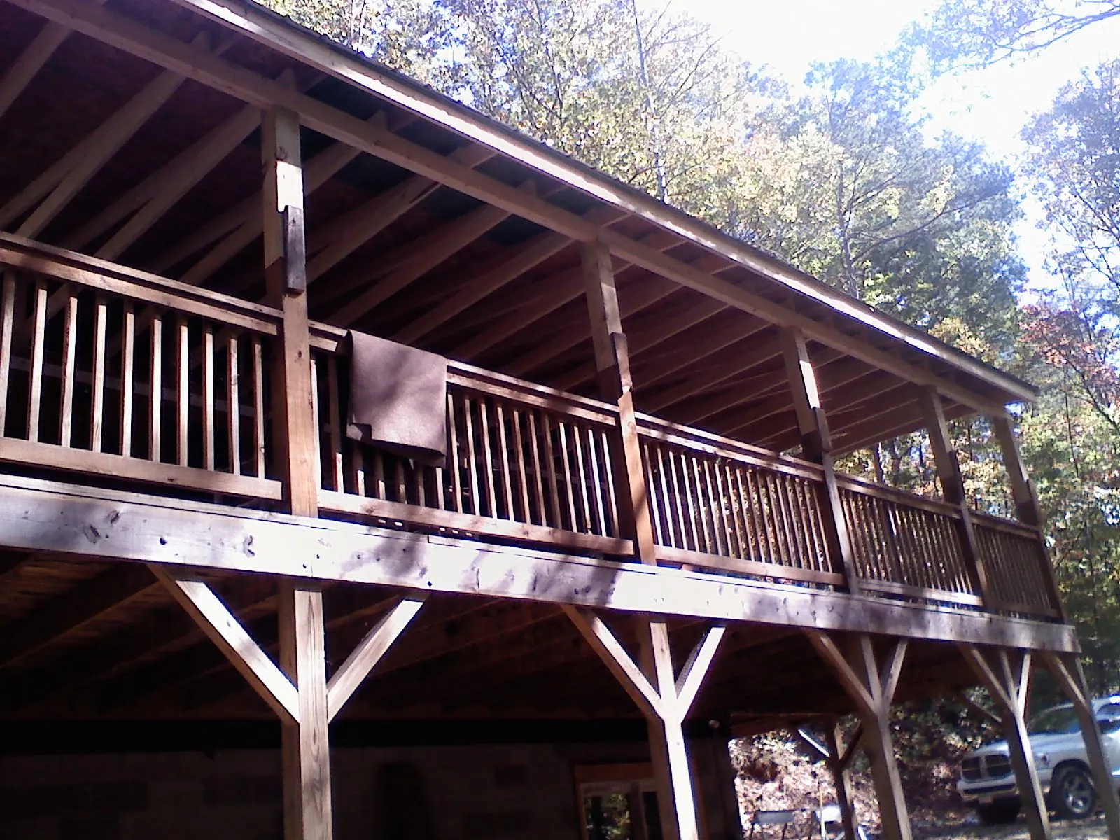 Timber framing under a new elevated porch and deck — Roof Leak Repair in Hyrum by Roofing Brothers